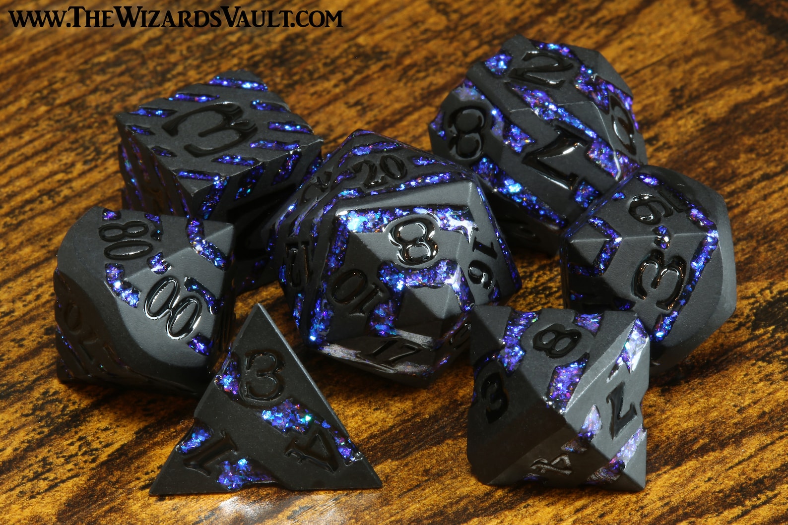 Rift Artifact - Heavy black metal dice with iridescent blue stripe - The Wizard's Vault