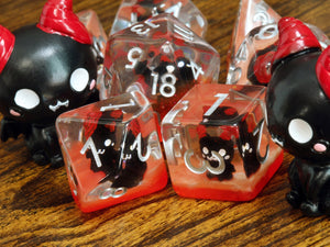 Demonic Cat dice set - Dice set with winged cats on an orange layer - The Wizard's Vault