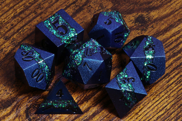 Mana Ore, turquoise green mica stripe dice set with blue metal - The Wizard's Vault