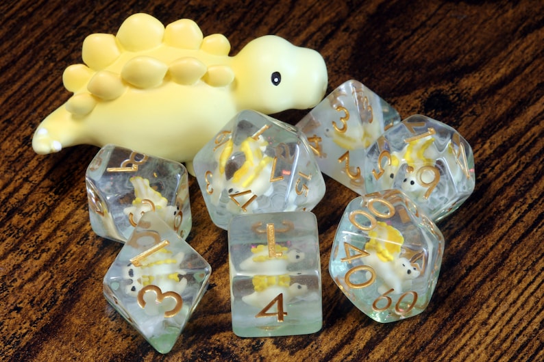 Yellow Baby Stegosaurus dice set, Dinosaur dice - The Wizard's Vault