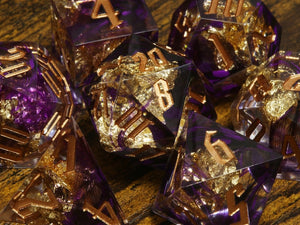 Coualt's Blessing dice set - Purple feather sharp edge dice set with gold flakes - The Wizard's Vault