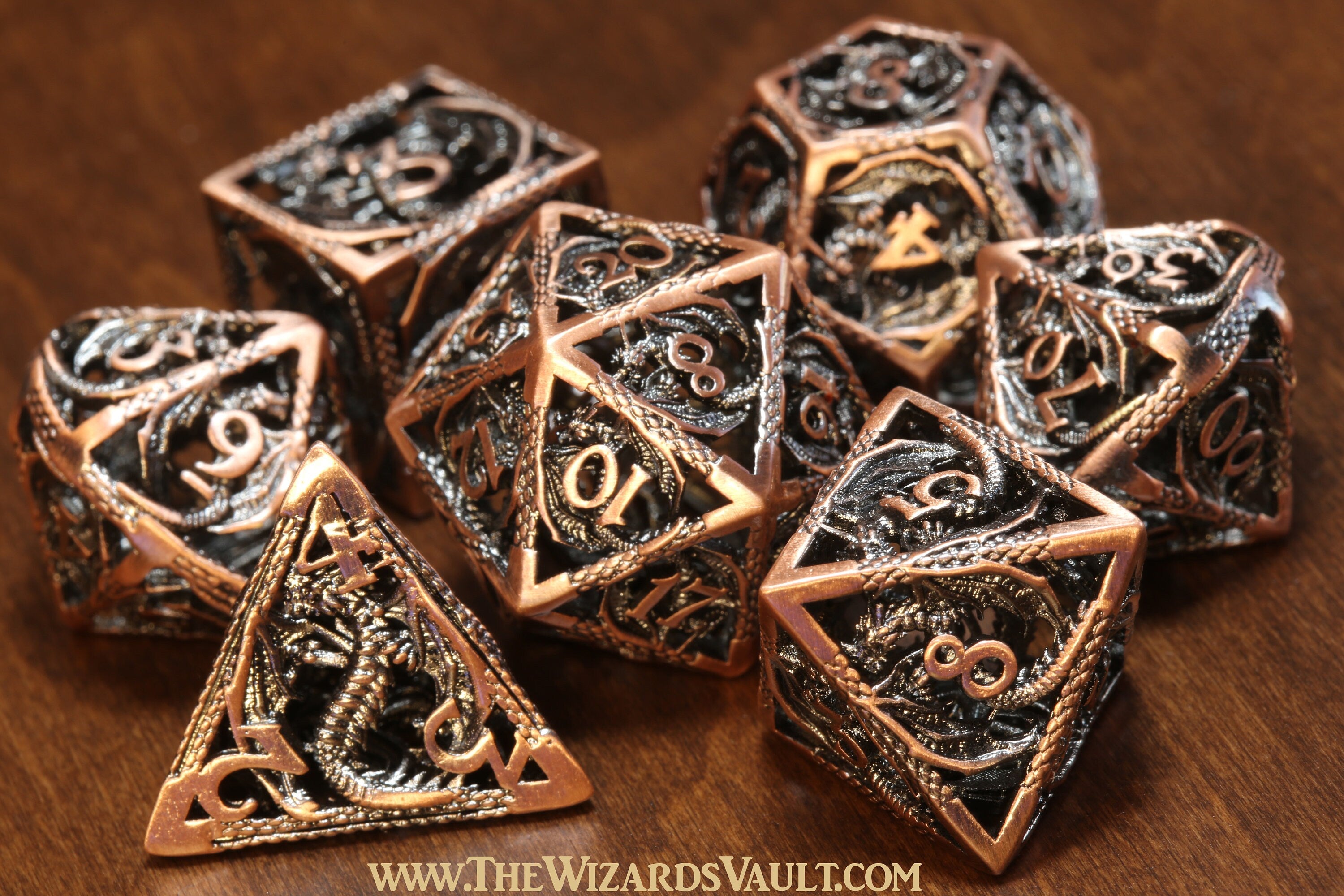 Metallic Dragon Dice Set - Hollow antique metal dice with dragon patterns - The Wizard's Vault