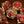 Red flowers sharp edge dice set with gold flakes and holographic glitters - The Wizard's Vault