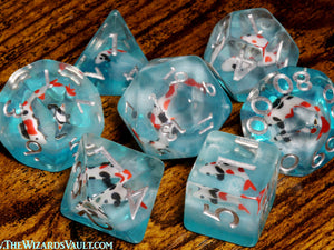 Ocean Koi dice set - DND Dice set with small fish on a blue layer - The Wizard's Vault